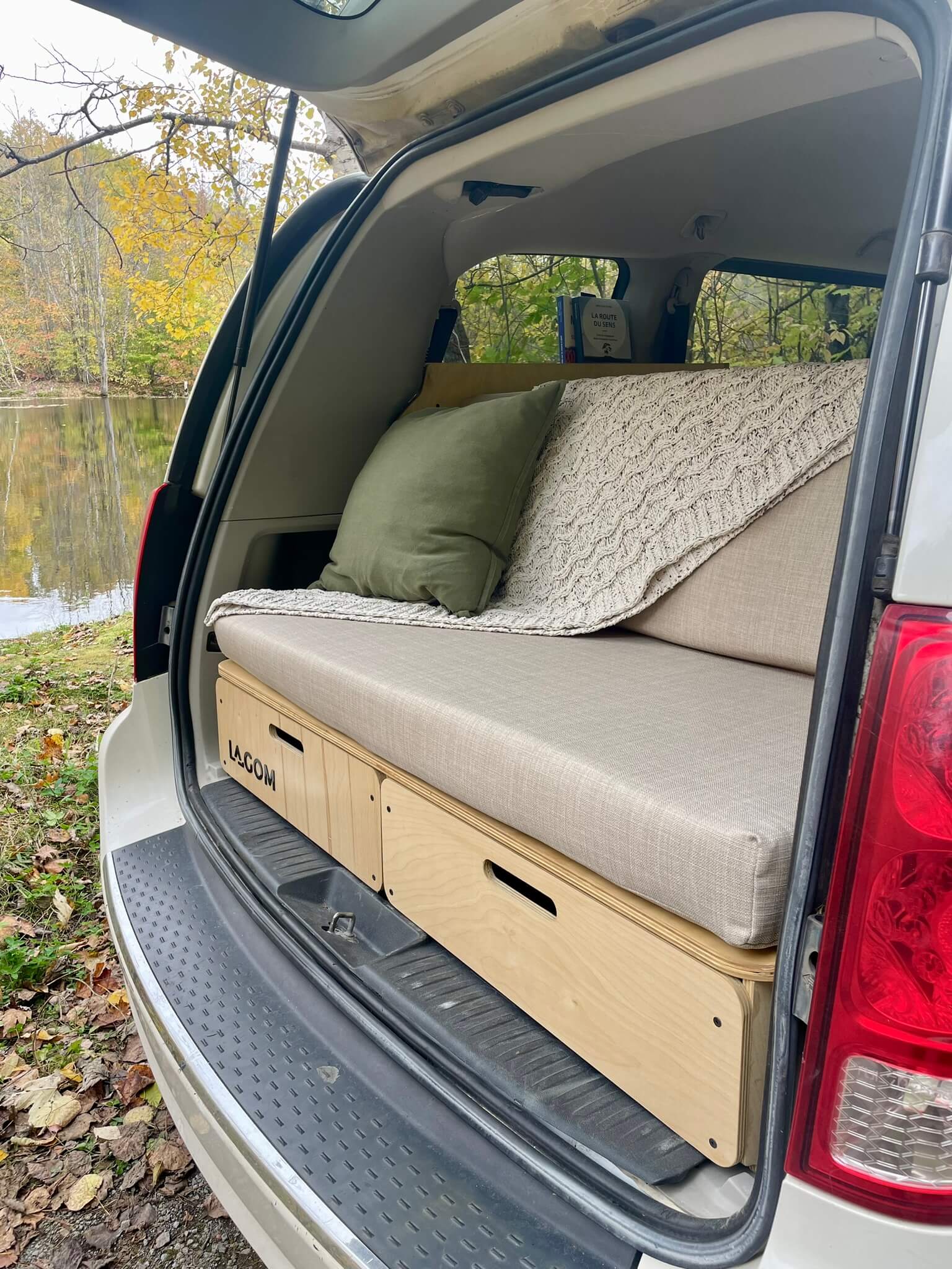 Lagom conversion minivan camper outside sofa with a view